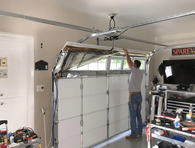 Garage door section replacement by Norwich Garage Door Repair in Norwich